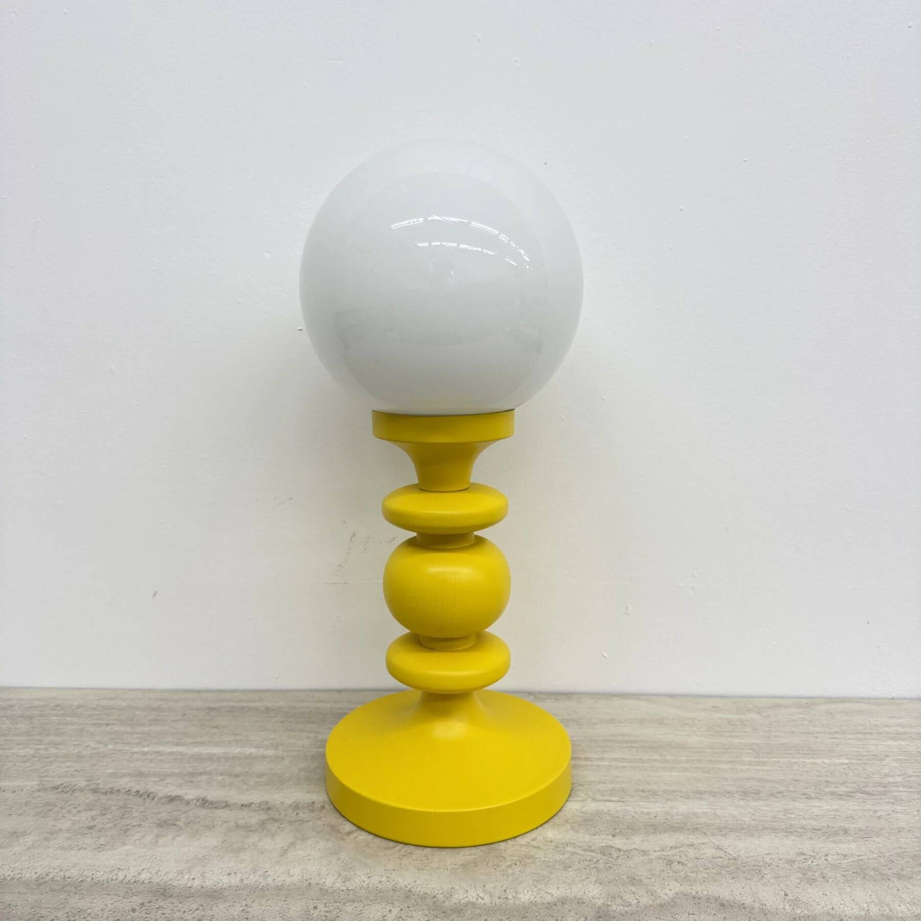 Mid-century design yellow table lamp with glass globe, 1970s