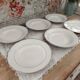Set of 6 deep plates in fine porcelain from Bohemia with a gold rim.