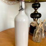 MKM white stoneware bottle