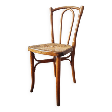Antique chair with caned seat