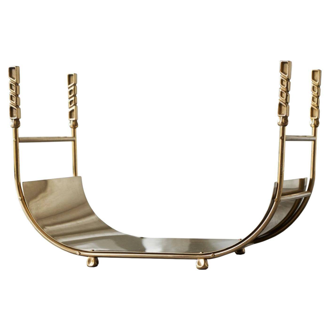 Sculptural brass magazine rack or basket from the 1970s.