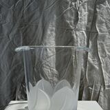 Glass ice or champagne bucket with stylized petal patterns