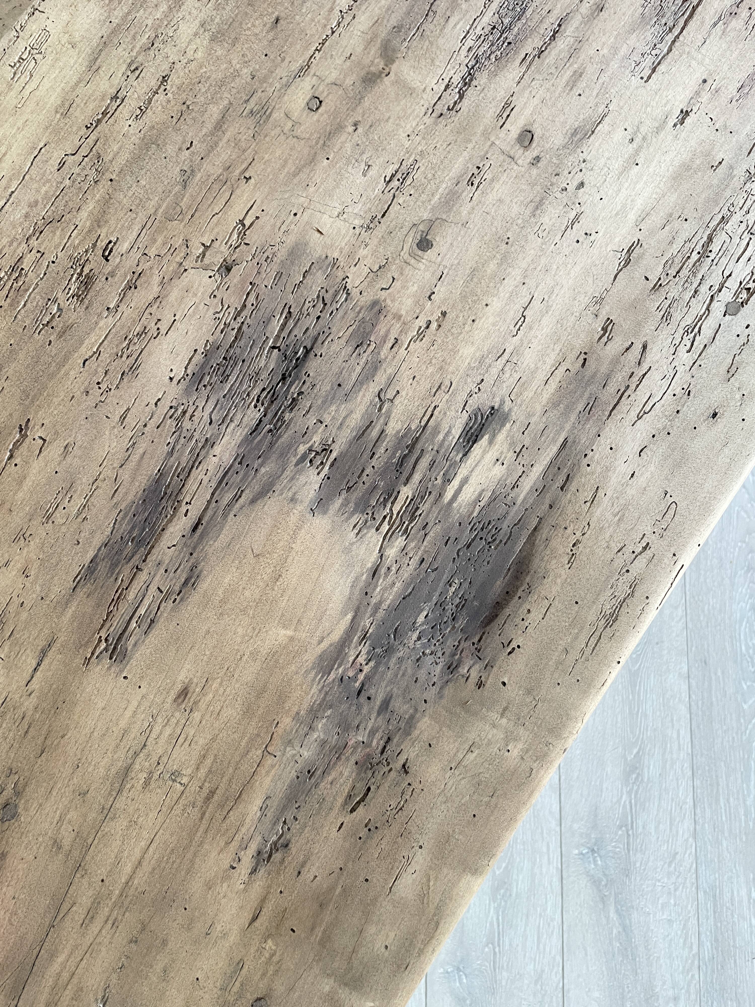 Vintage farm table with spindle legs.