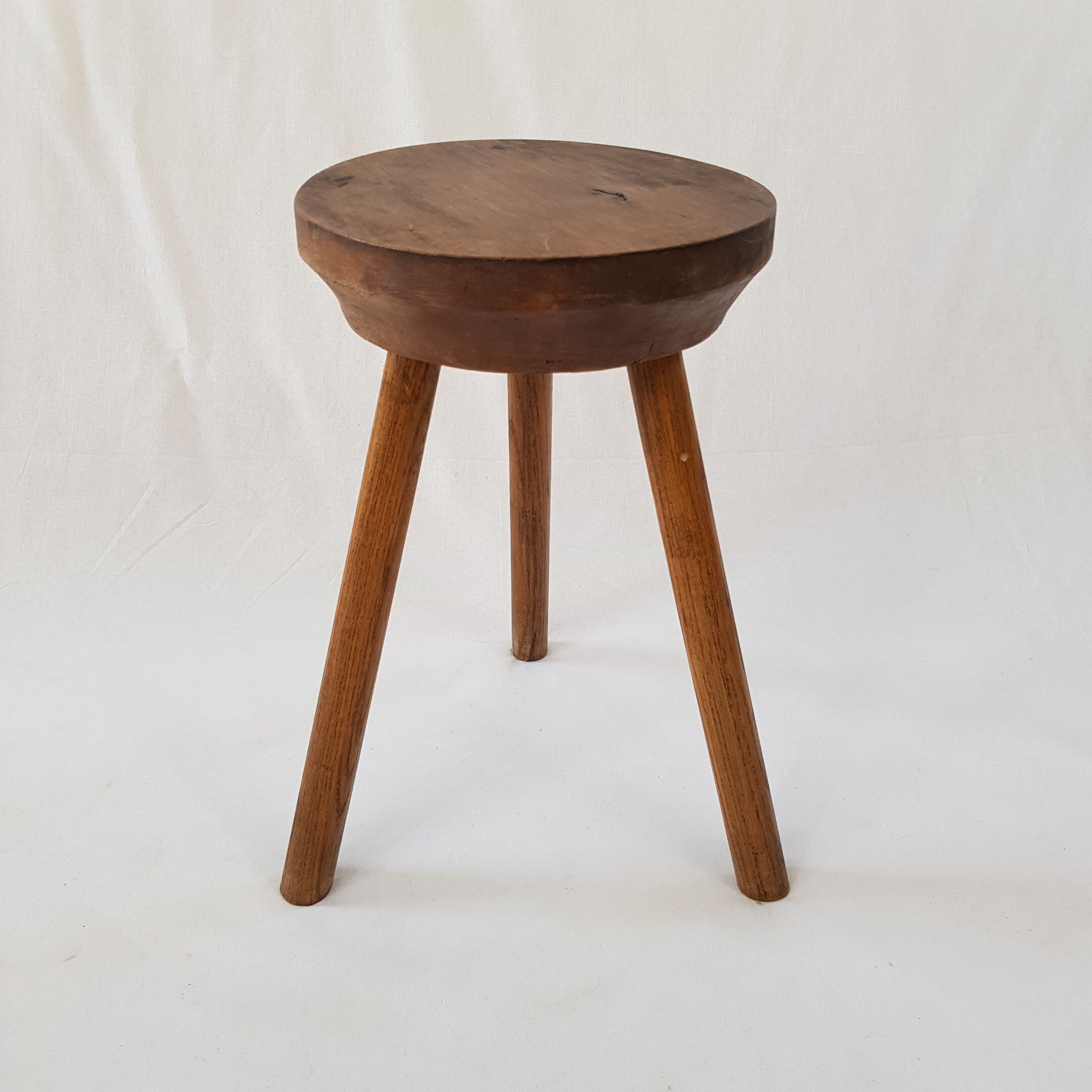 Wooden tripod stool
