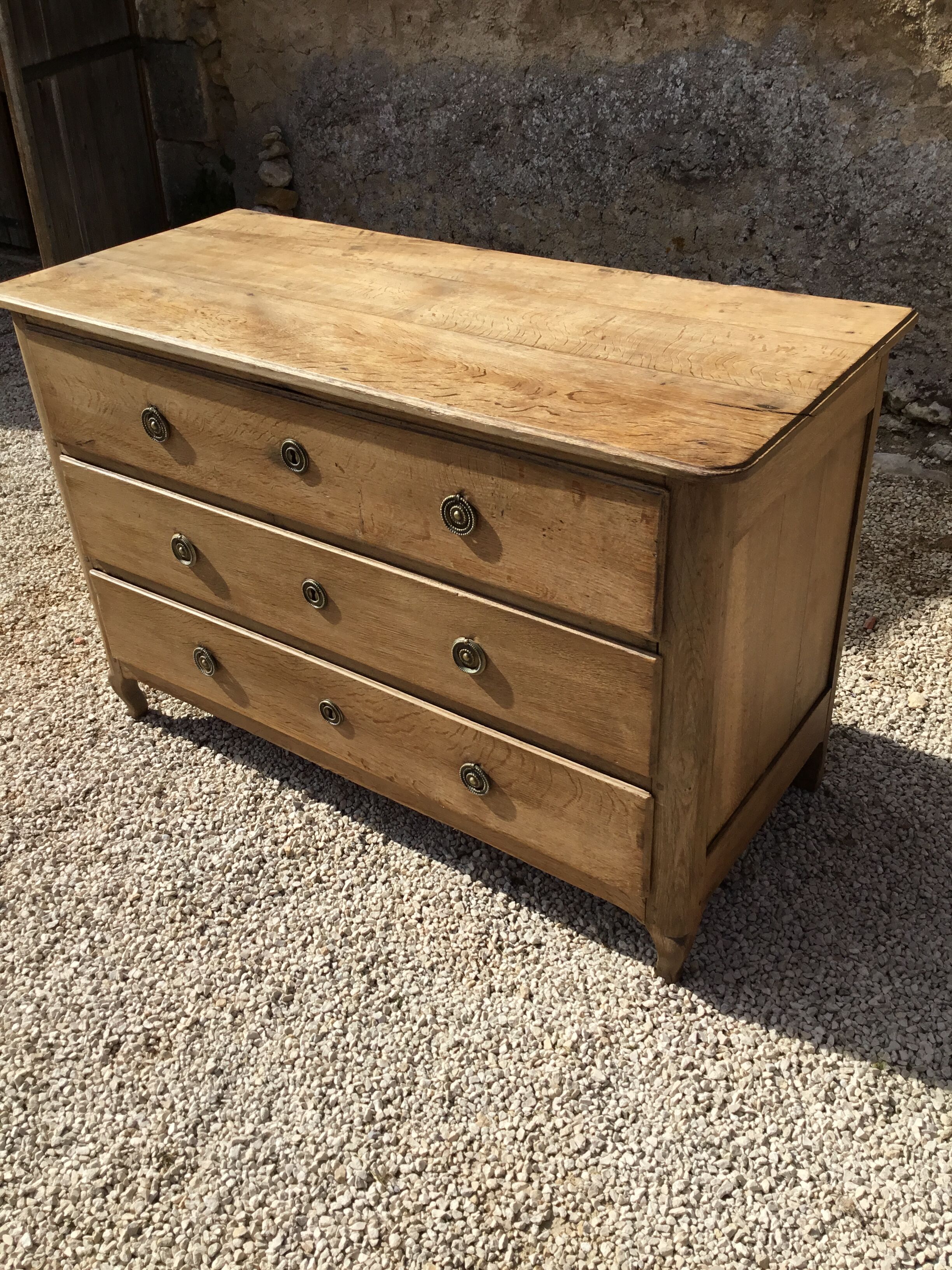 Louis XVI period chest of drawers opening on three drawers