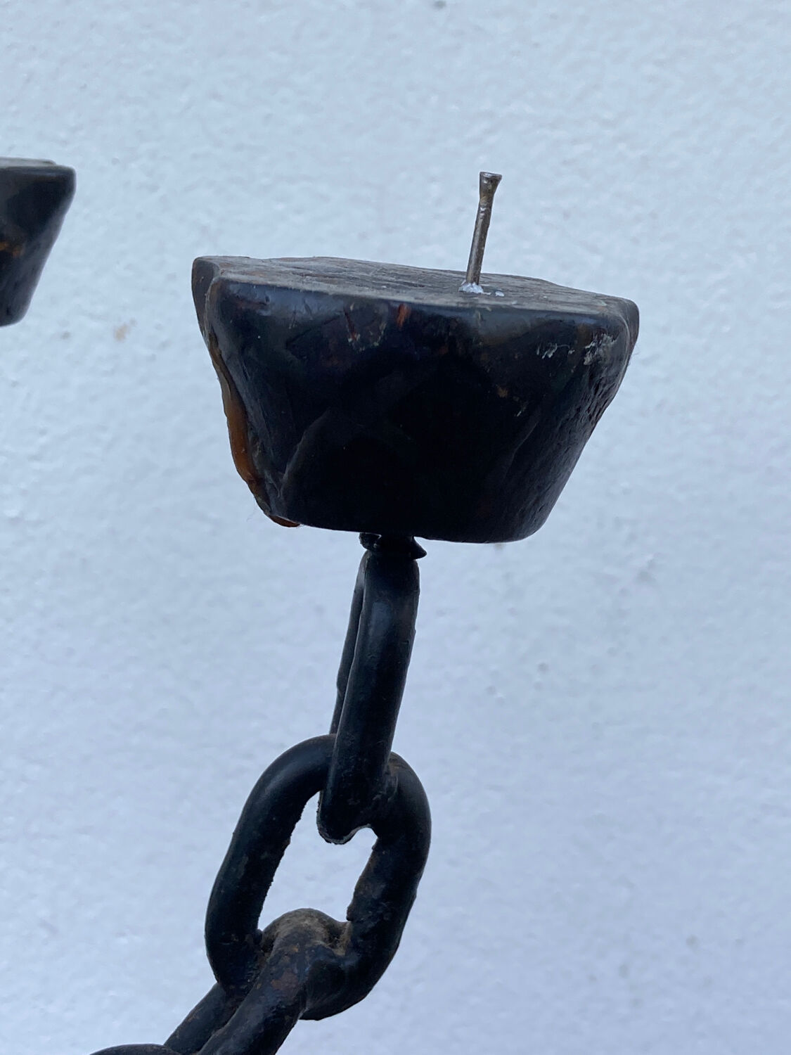 Brutalist iron and wood chain candle holder from the 1970s