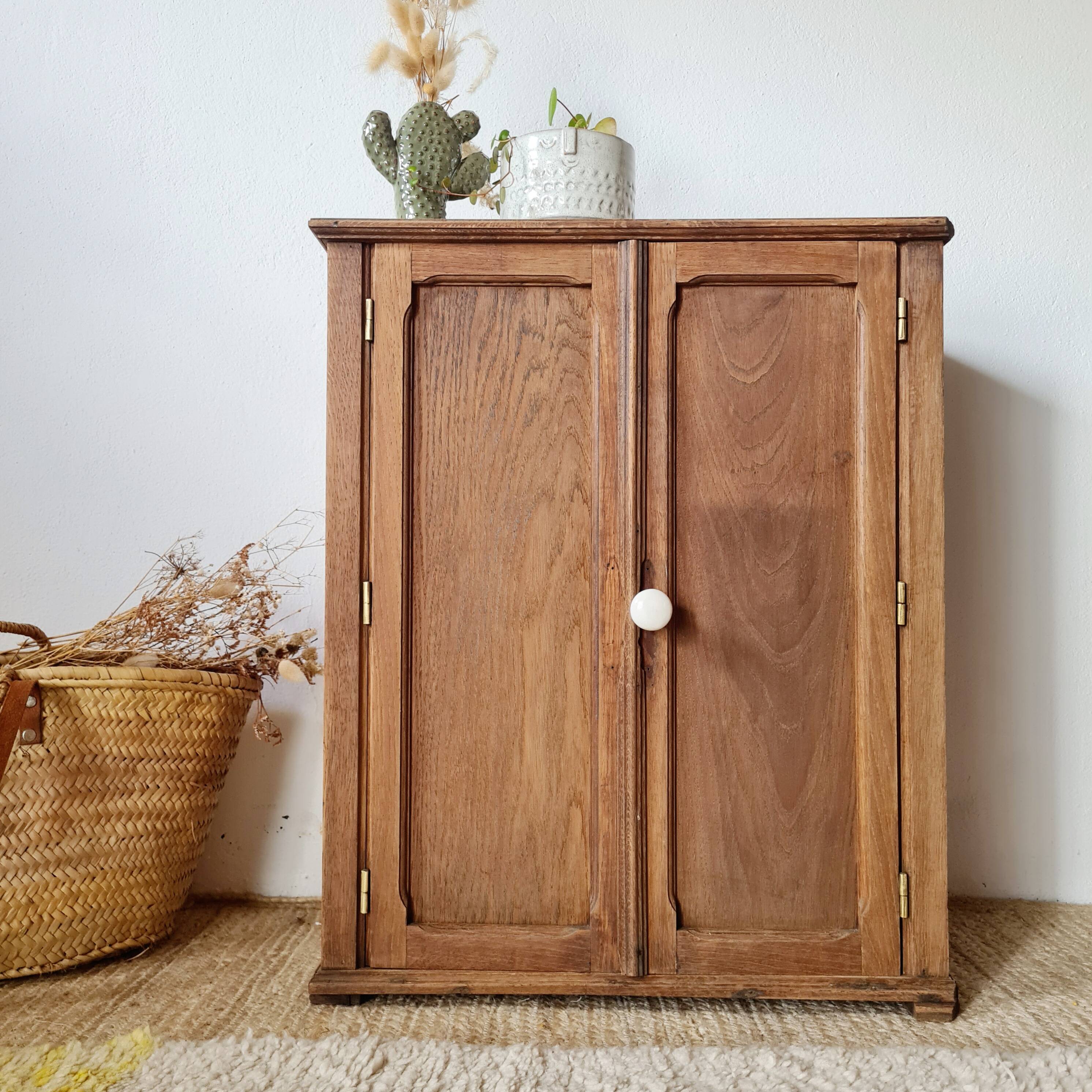 Small Parisian oak wardrobe with its porcelain knob.