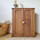 Small Parisian oak wardrobe with its porcelain knob.