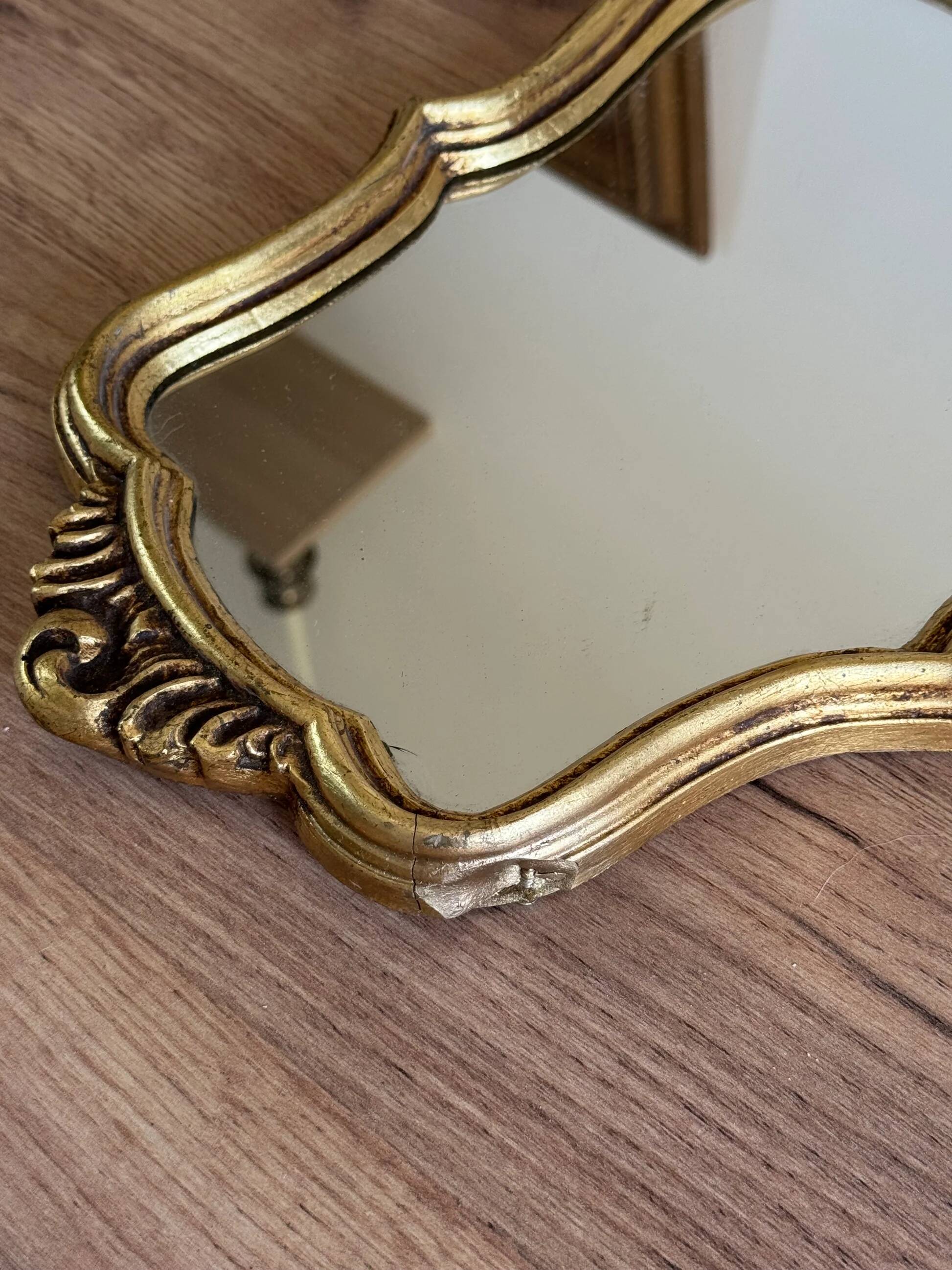 Vintage gold shell mirror