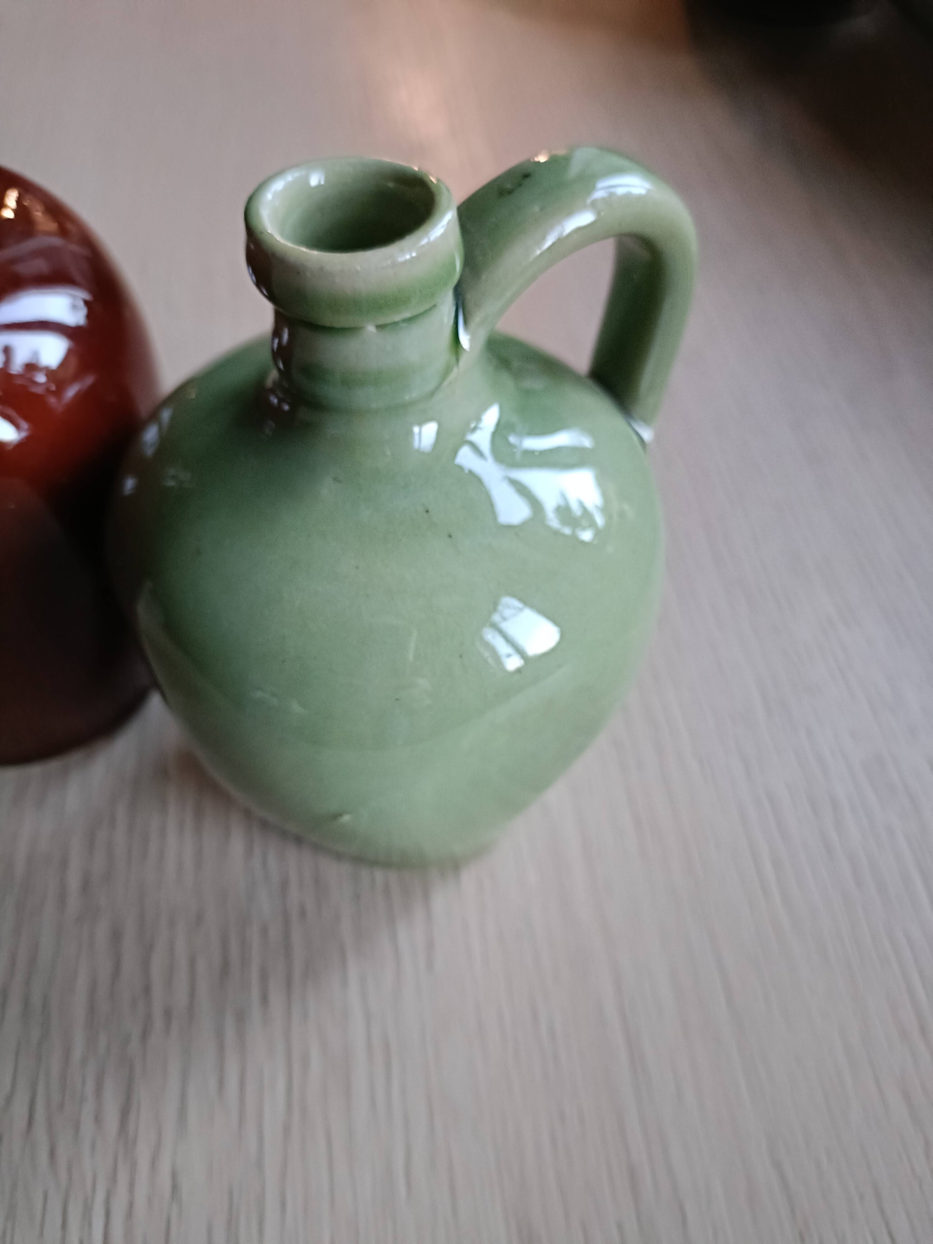 2 small glazed stoneware bottles
