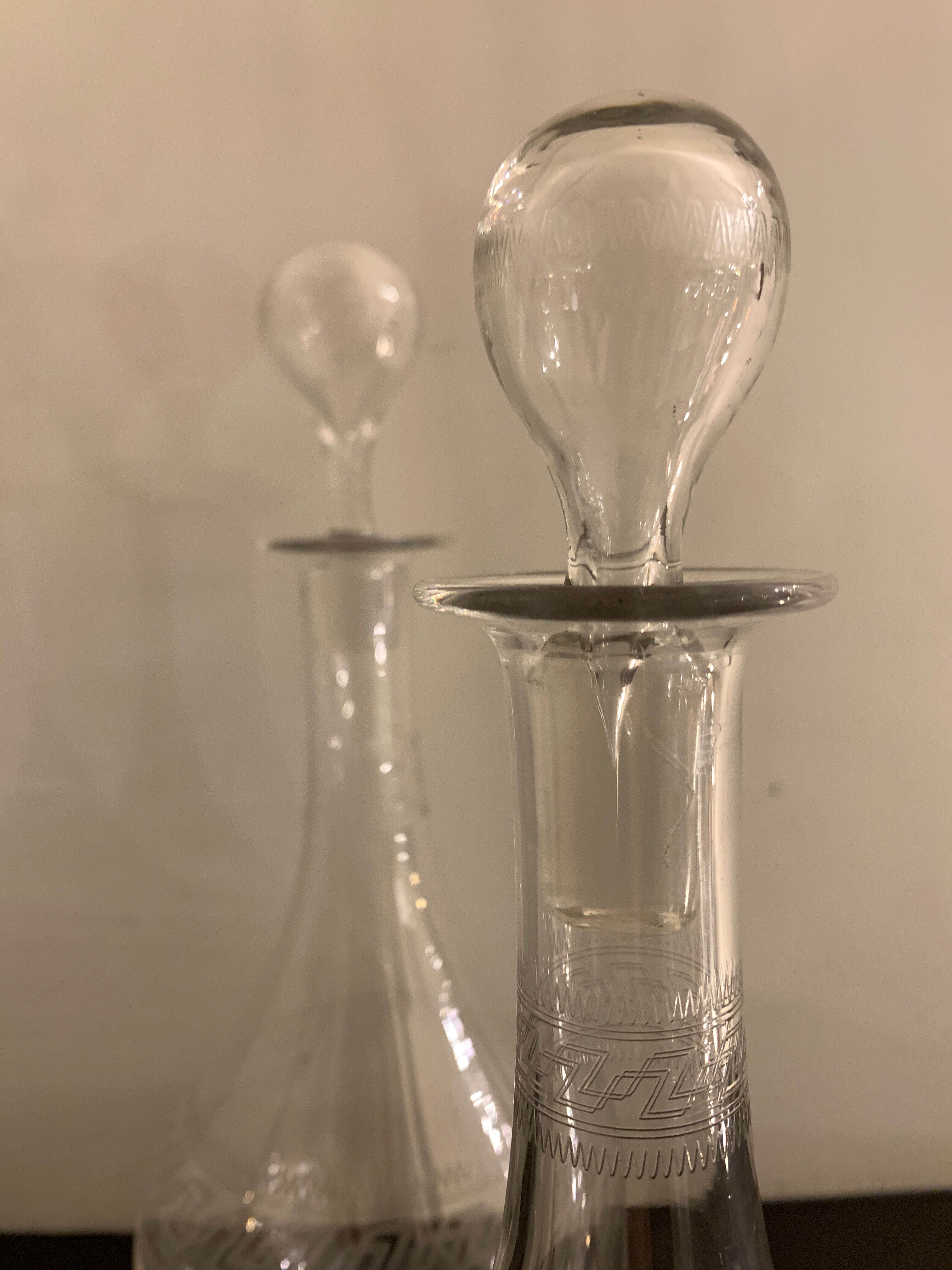 Pair of ancient decanters made of Baccarat crystal, Greek friezes