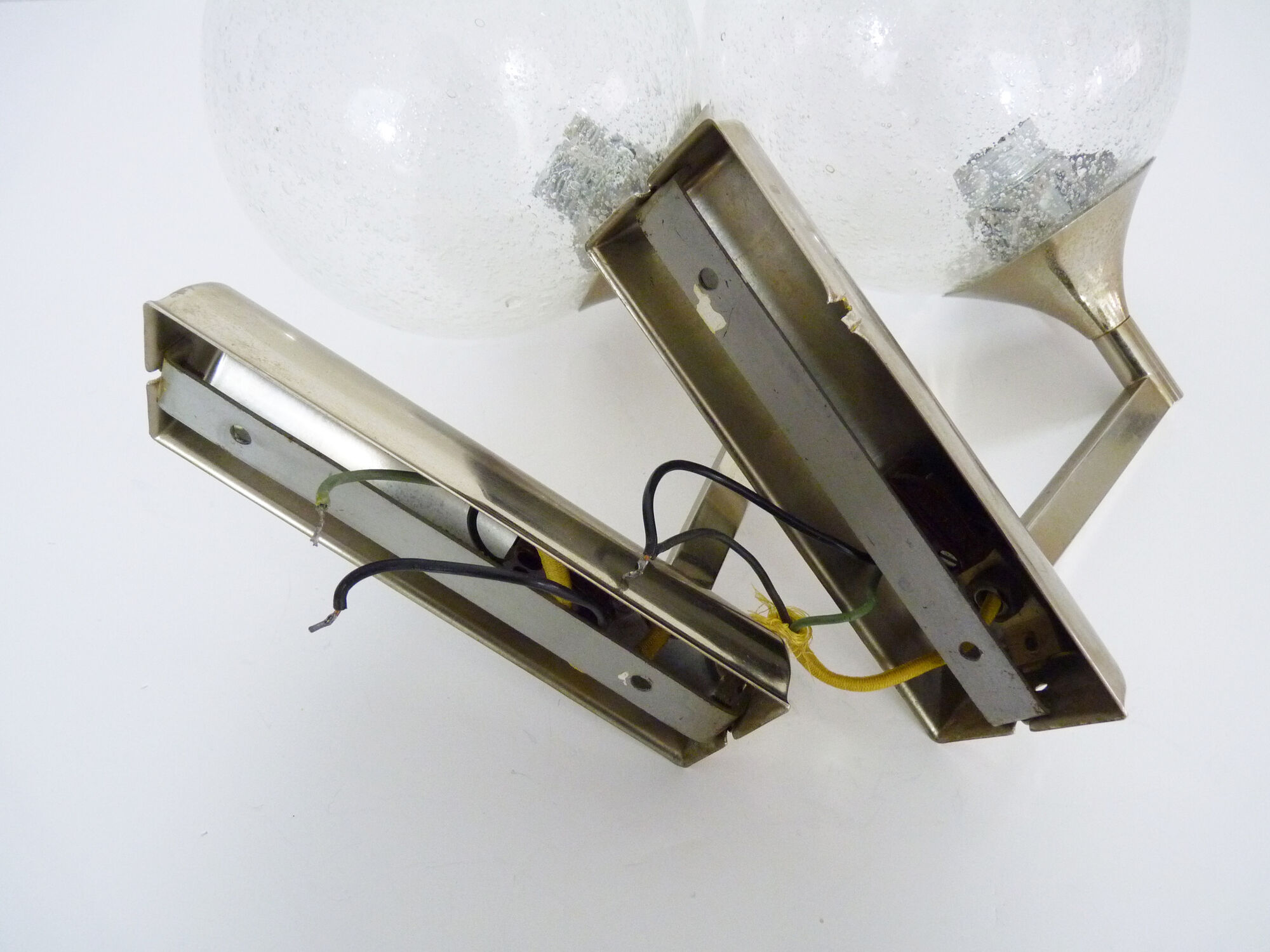 Pair of chrome metal wall sconces and blown glass