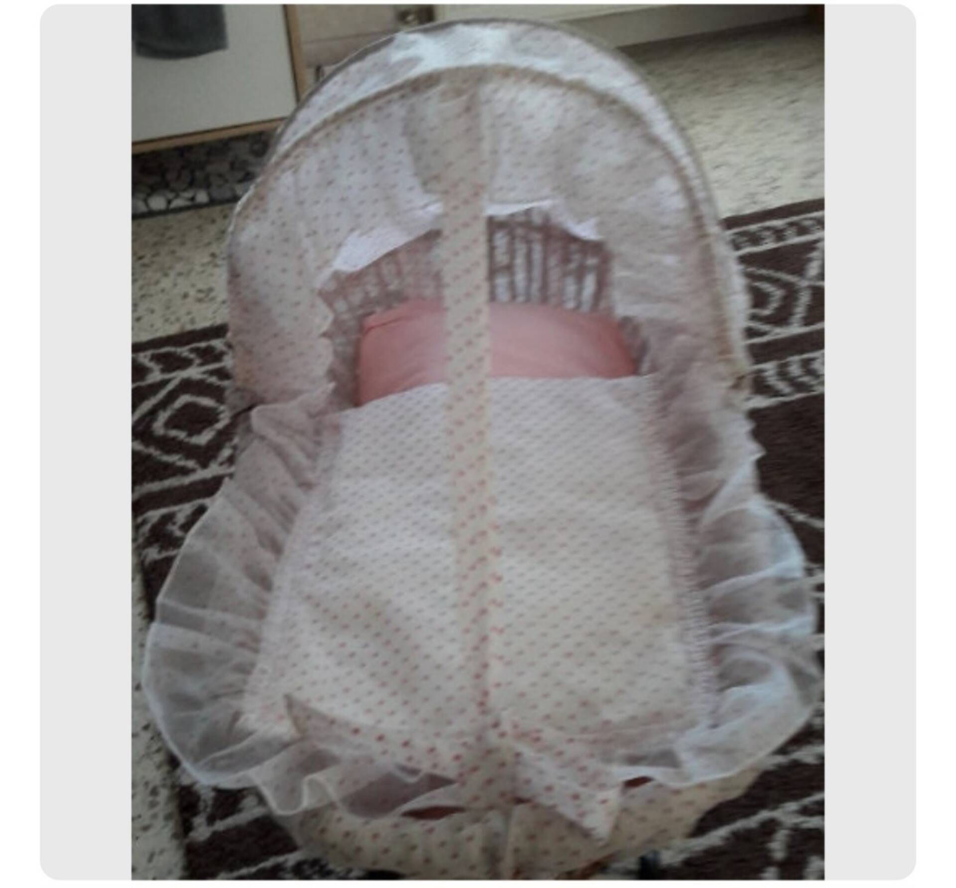 Rattan doll's cradle