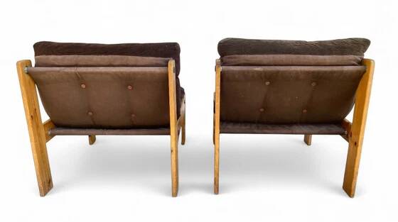 Pair of Neapel cotton and wood fireside chairs, circa 1960