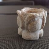 Candlestick in carved stone, signed