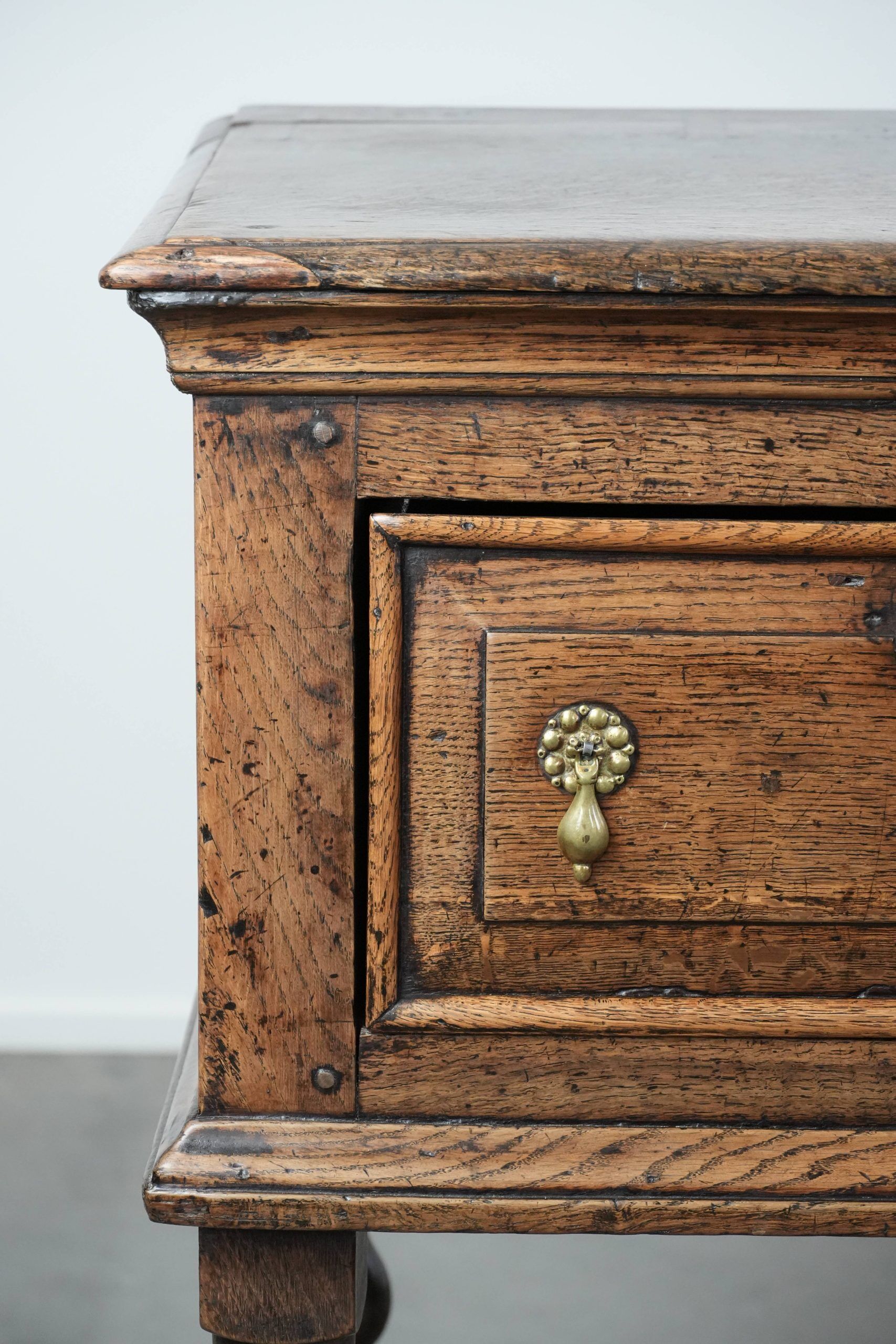 Antique English sideboard from the early 18th century made of oak