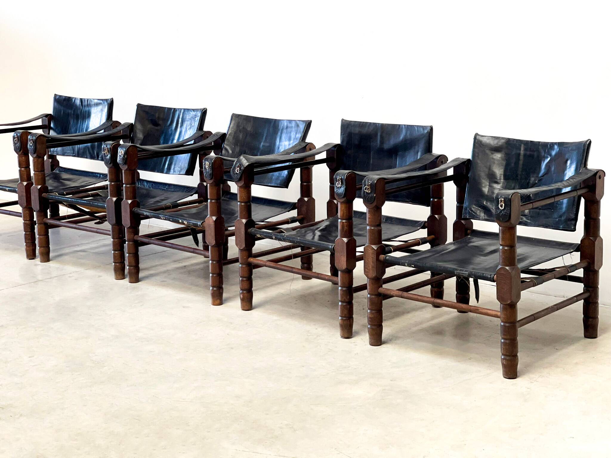 Mid century leather safari armchairs, 1960s