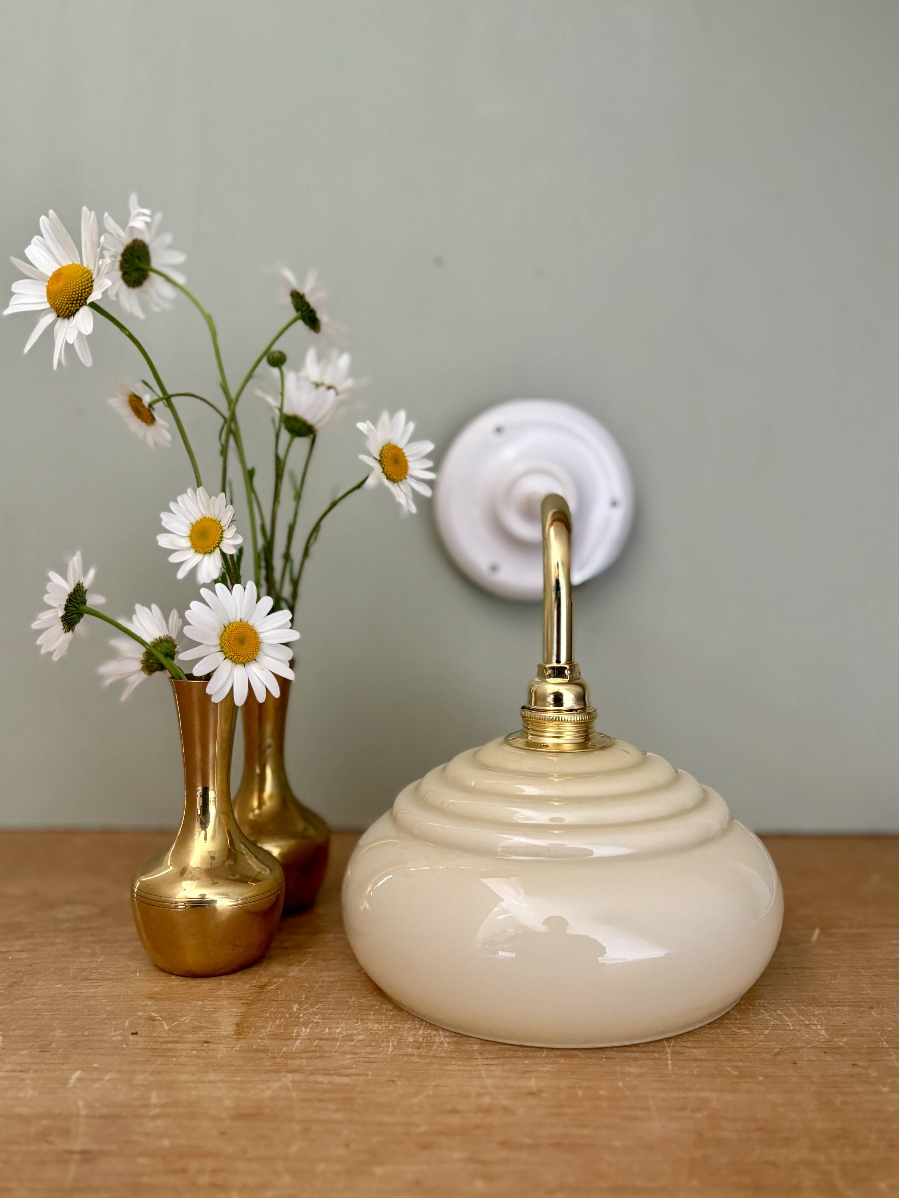 Vintage angled wall lamp with pale yellow opaline shade