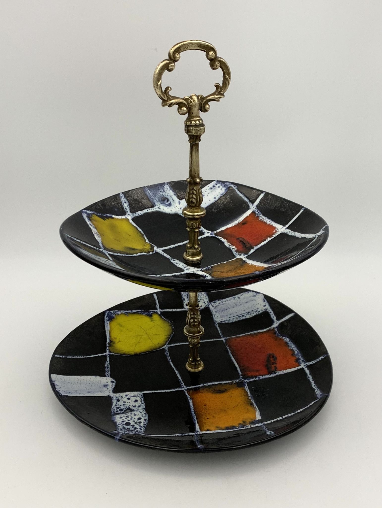 Vintage ceramic and brass cake display 1950s