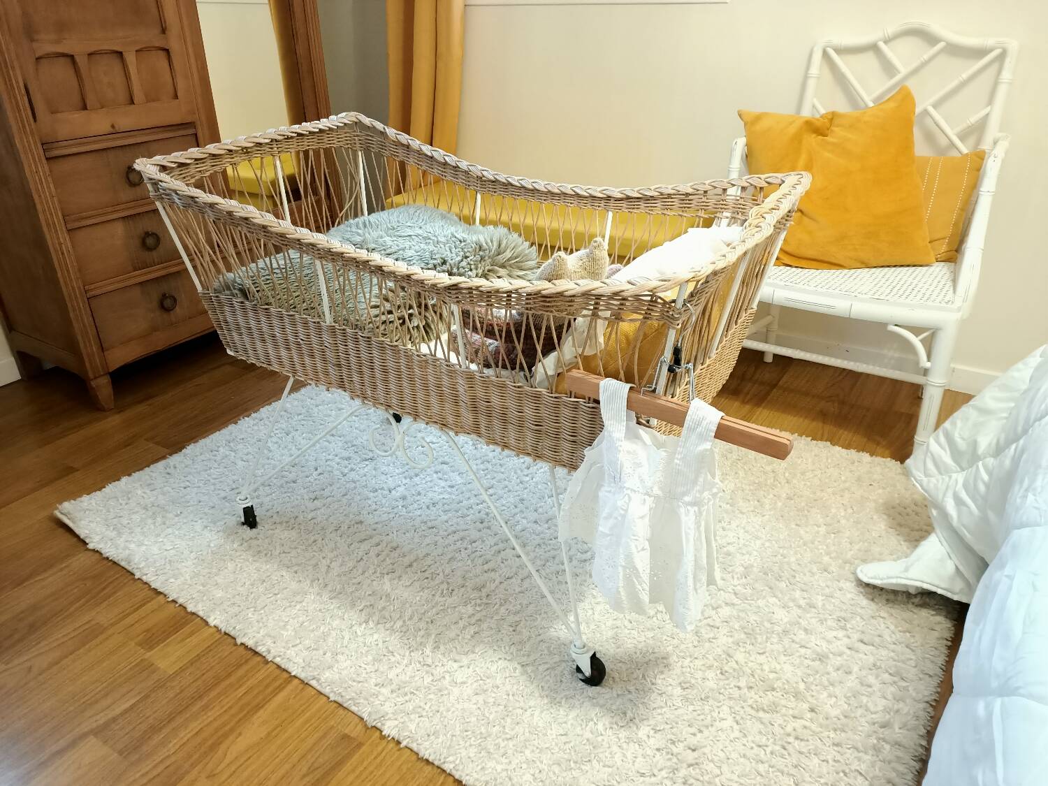 Rattan and wrought iron cradle