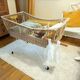 Rattan and wrought iron cradle