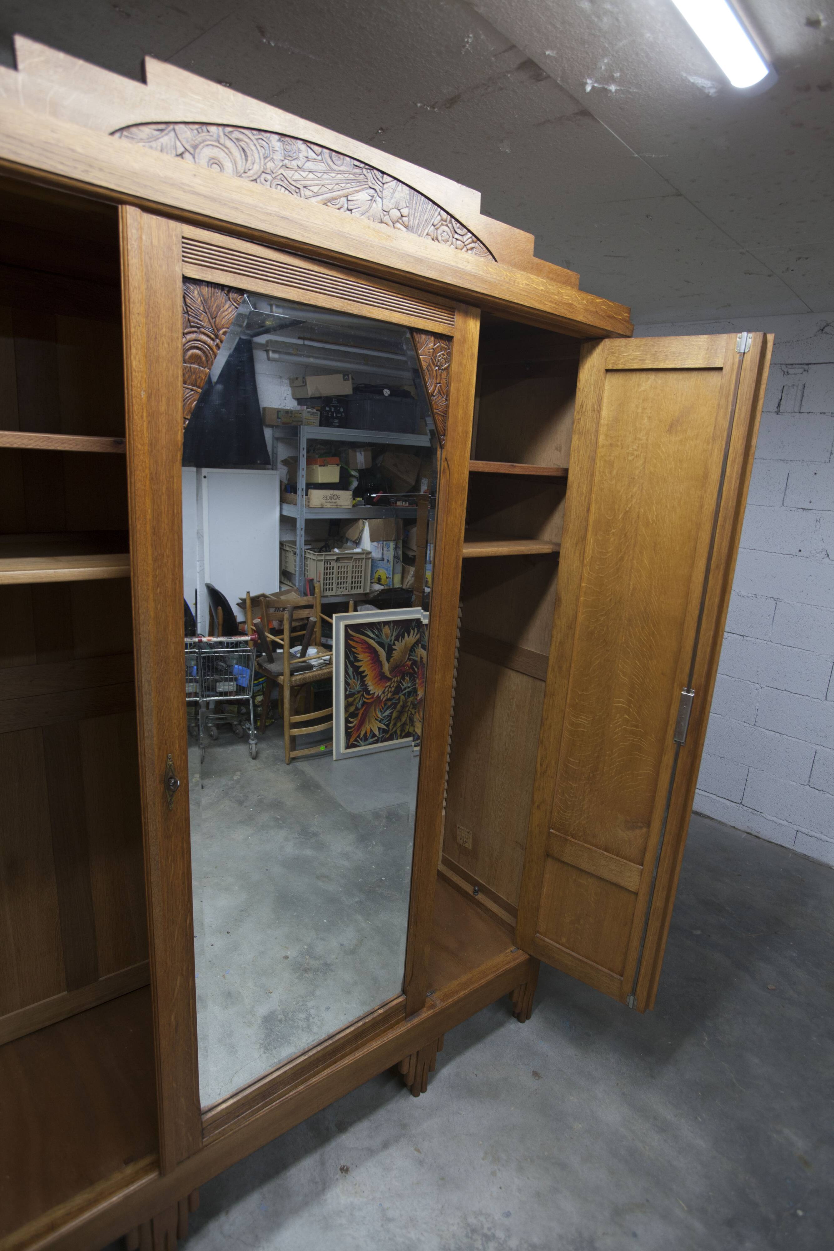 Art Deco carved oak wardrobe - Flemish workshop circa 1930