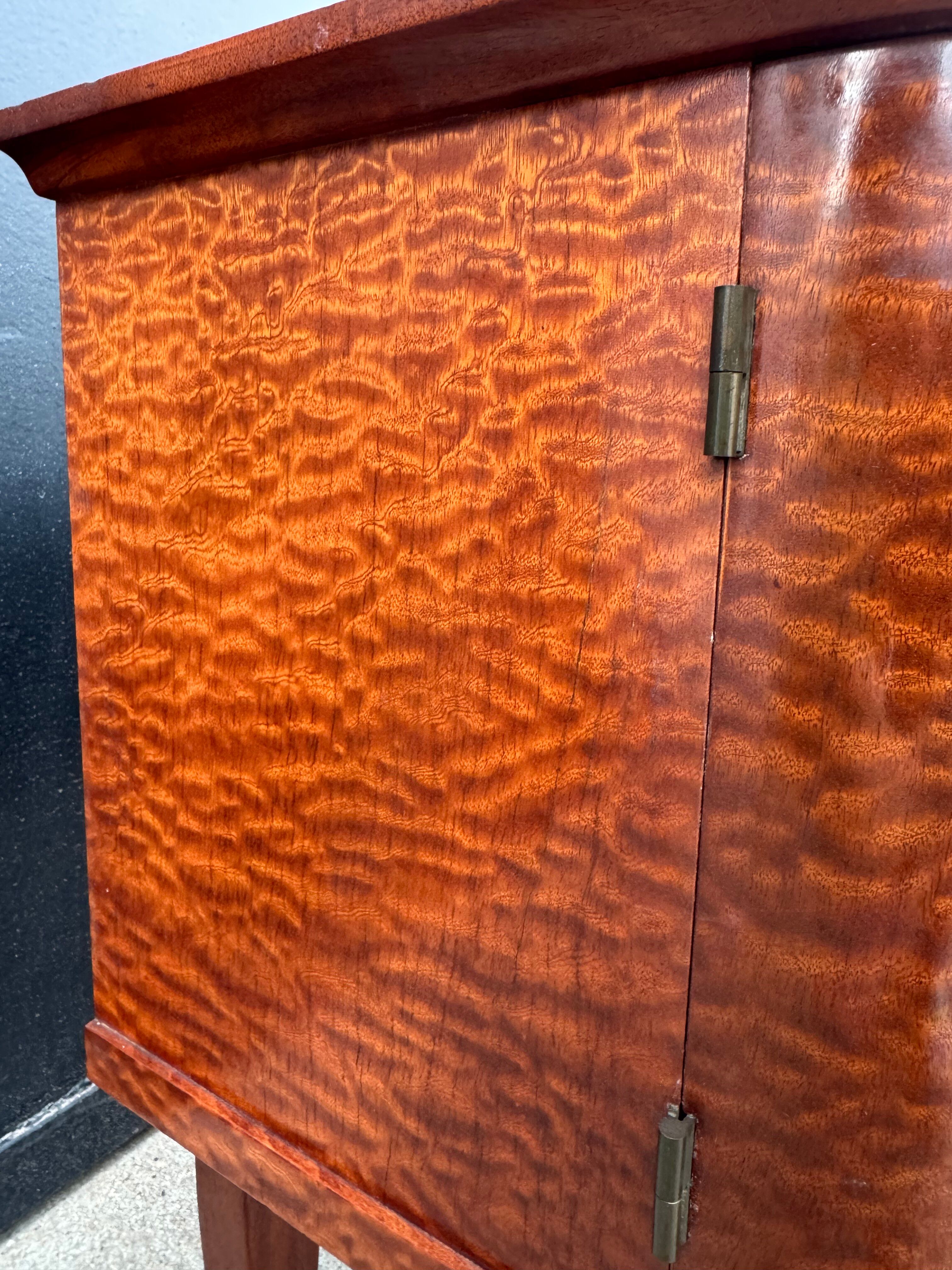 Mahogany veneered bedside table from the 1950s.
