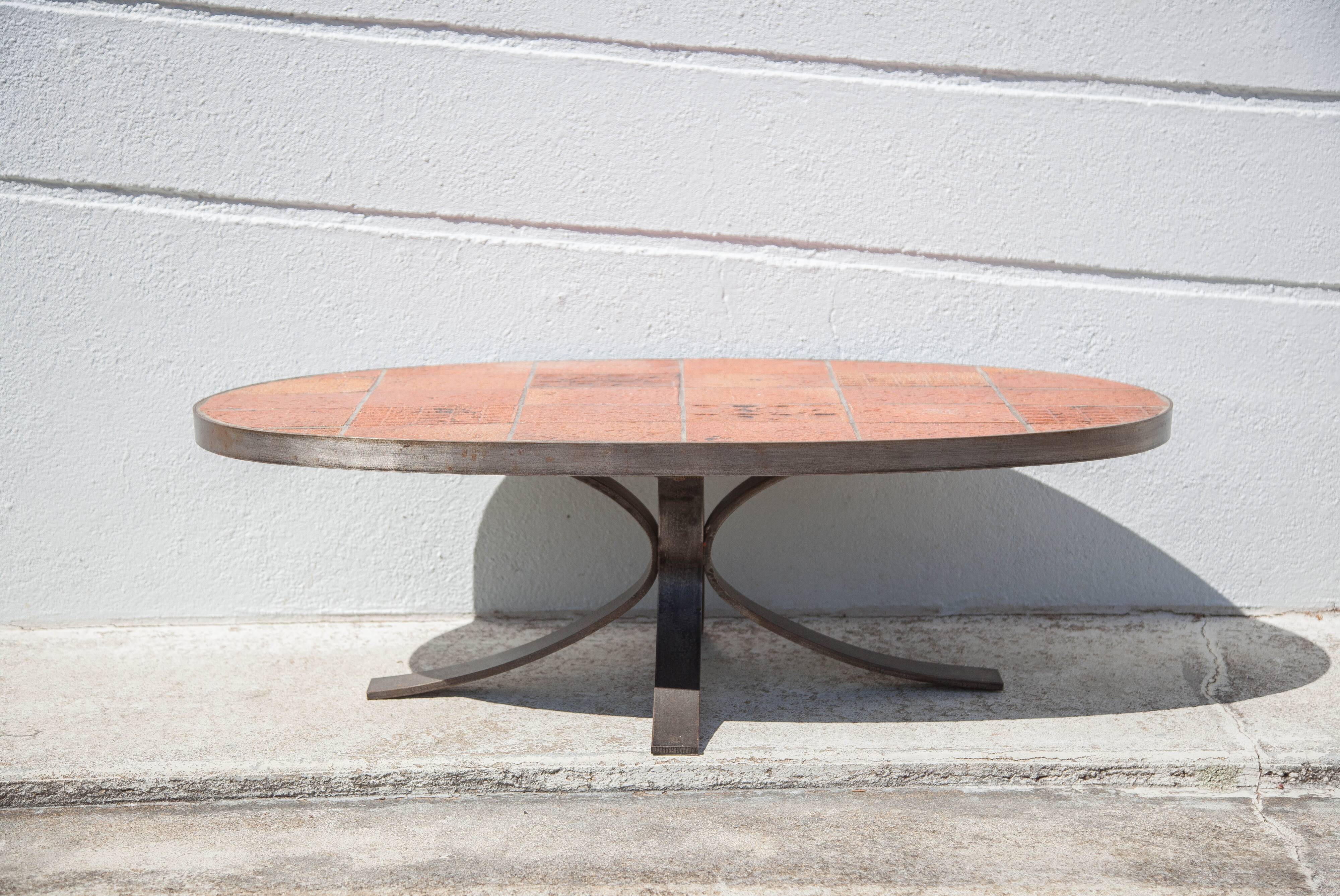 Jean Jaffeux coffee table, glazed lava stone table with wrought iron structure, 60's