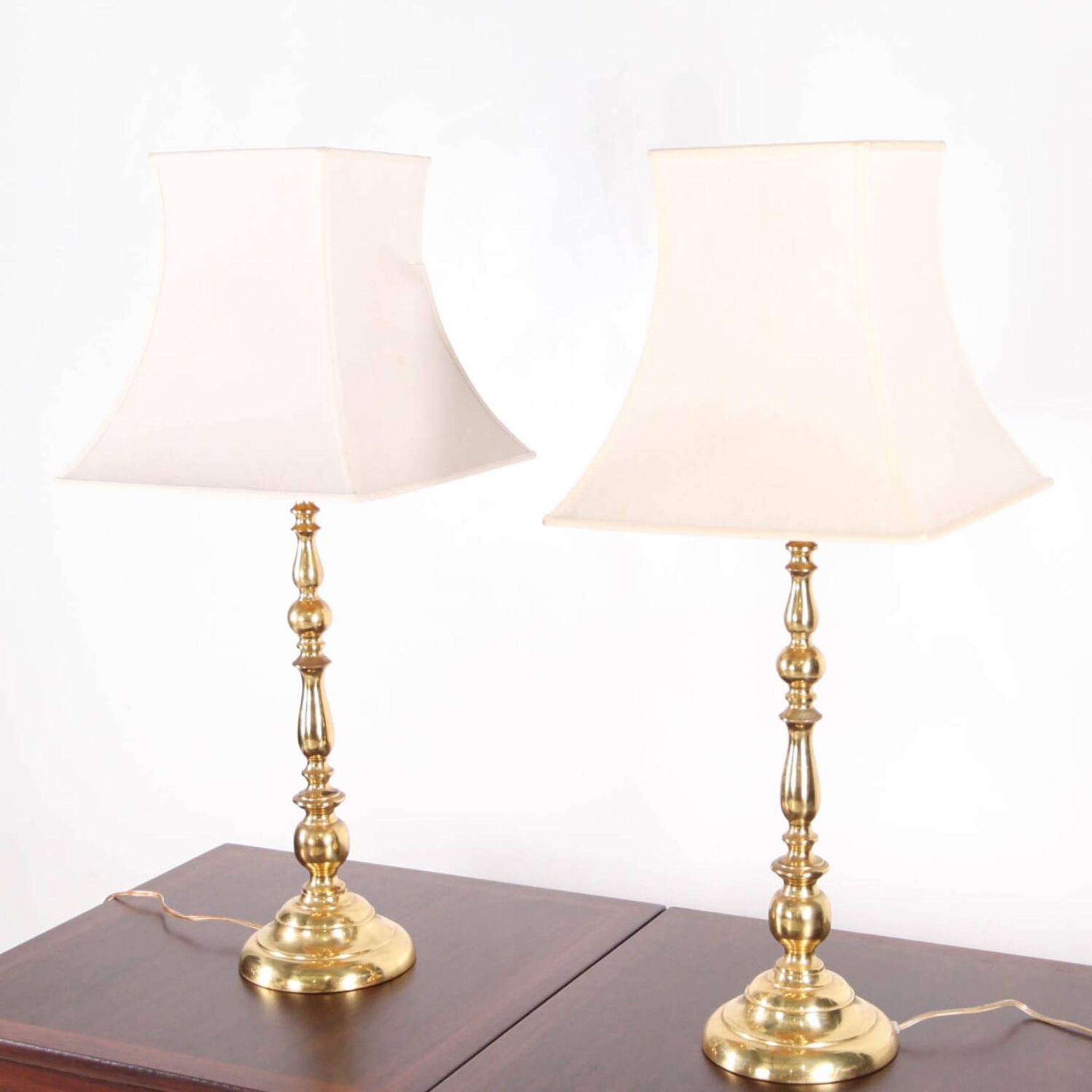 Pair of large brass lamps