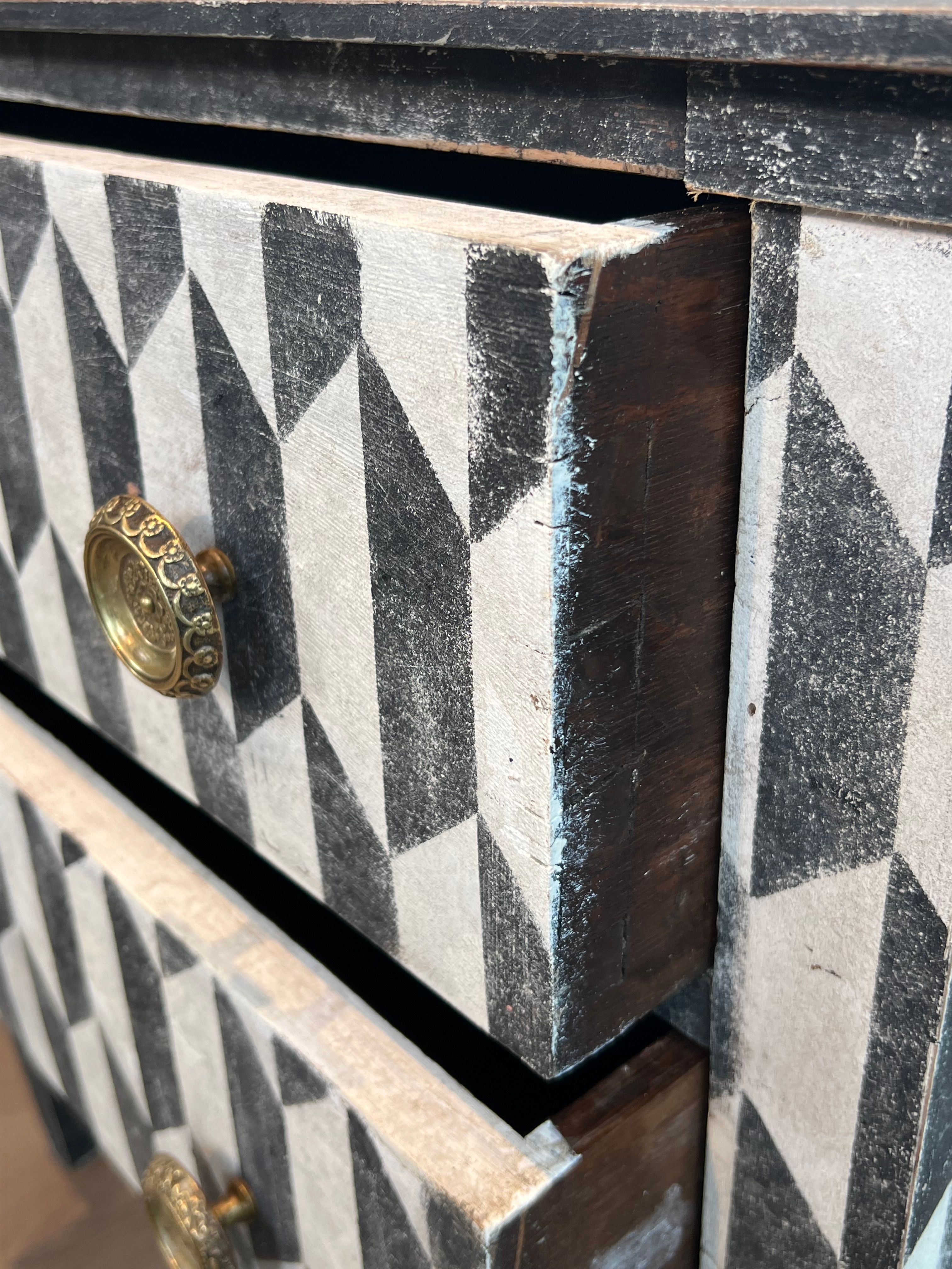Small Italian chest of drawers with two drawers, patinated with a trompe-l'œil checkerboard pattern