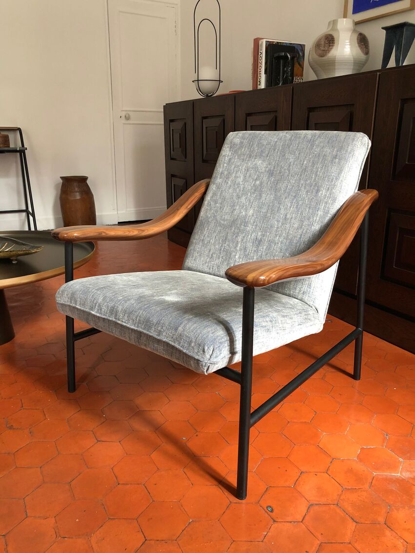 Armchair with walnut armrest