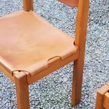 Pair of brutalist chairs in elm and stretched leather with saddle stitching Self publisher