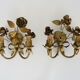 Pair of gilded metal sconces decorated with flowers and foliage. Year 60