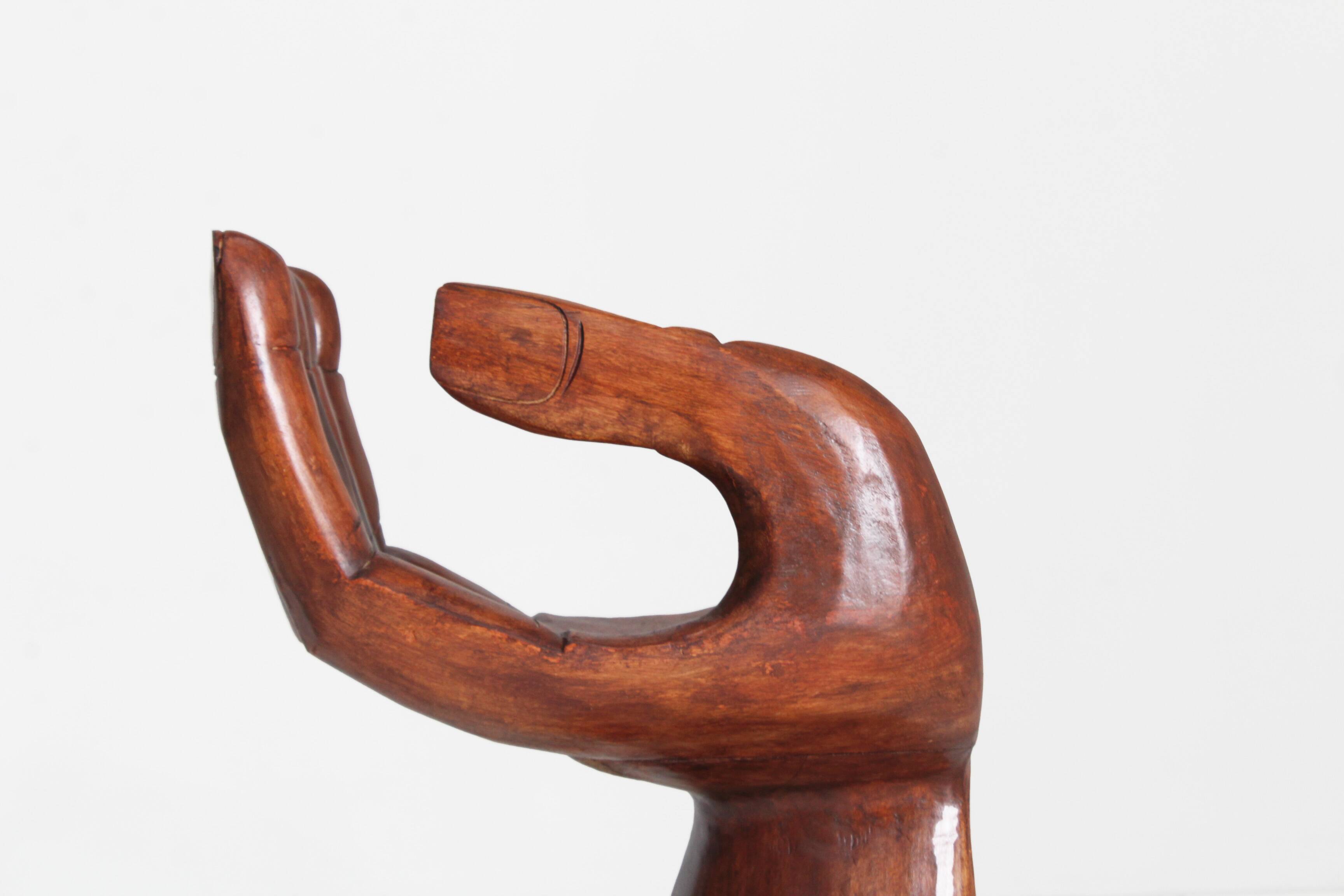 Sculptural wooden hand chair