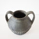 Vase with double handle in black sandstone