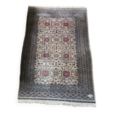 Antique Persian rug, signed.