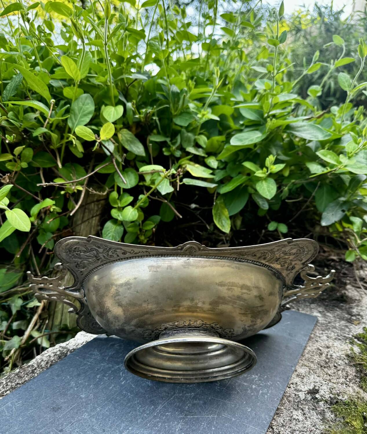 Large fruit bowl with mascaron signed WMF, Art Nouveau period.