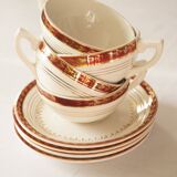 Set of 4 white, red and gold porcelain teacups, Ceranord