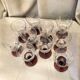 Suite de 10 verres a pied a vin en verre des annees 1930 bi colore