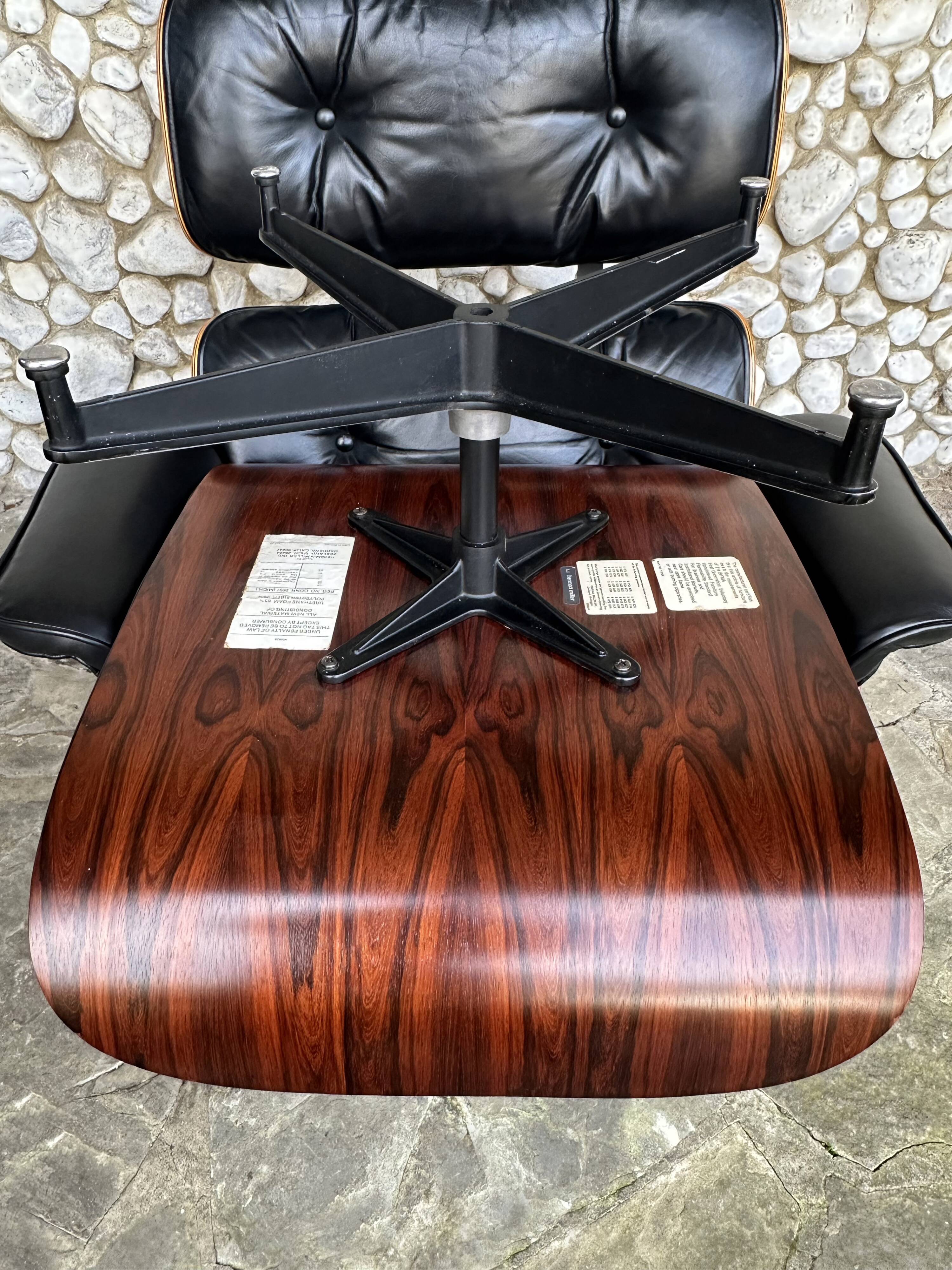 Fauteuil Lounge et ottoman Herman Miller Charles & Ray Eames, palissandre