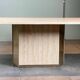 Dining table in travertine and brass. French work. Around 1970.