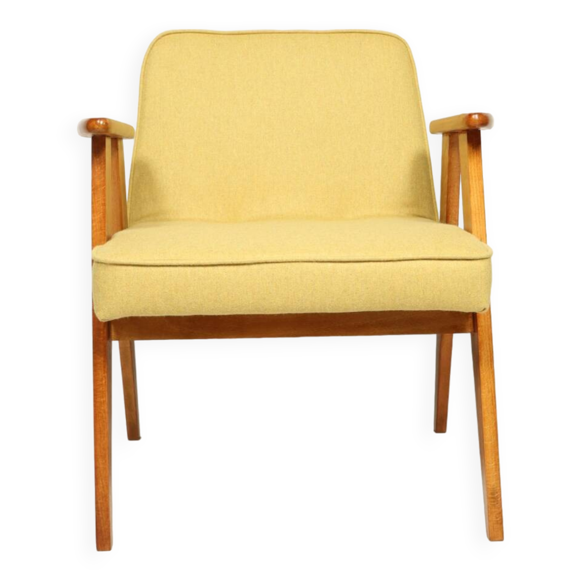 Fauteuil en laine jaune au design scandinave après rénovation