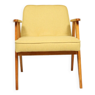 Fauteuil en laine jaune au design scandinave après rénovation