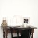 Curved black lacquered wooden armchair in Thonet style
