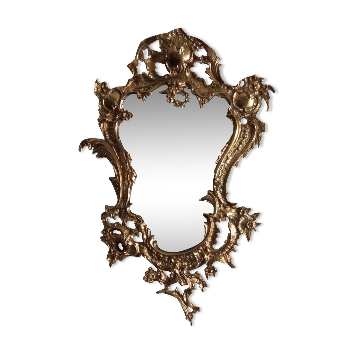 Antique mirror in gilded metal