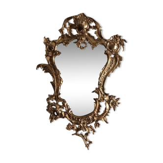 Antique mirror in gilded metal