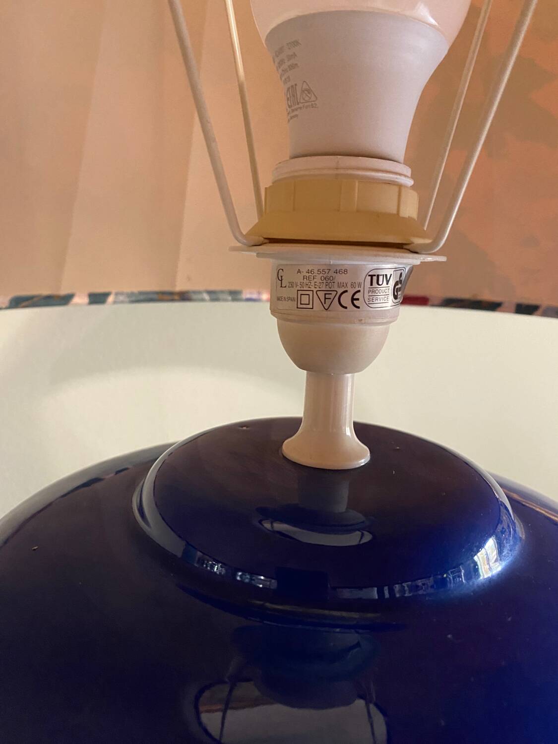 Large blue ceramic lamp with floral shade