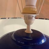 Large blue ceramic lamp with floral shade