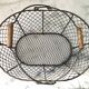 Basket in wire mesh and wood