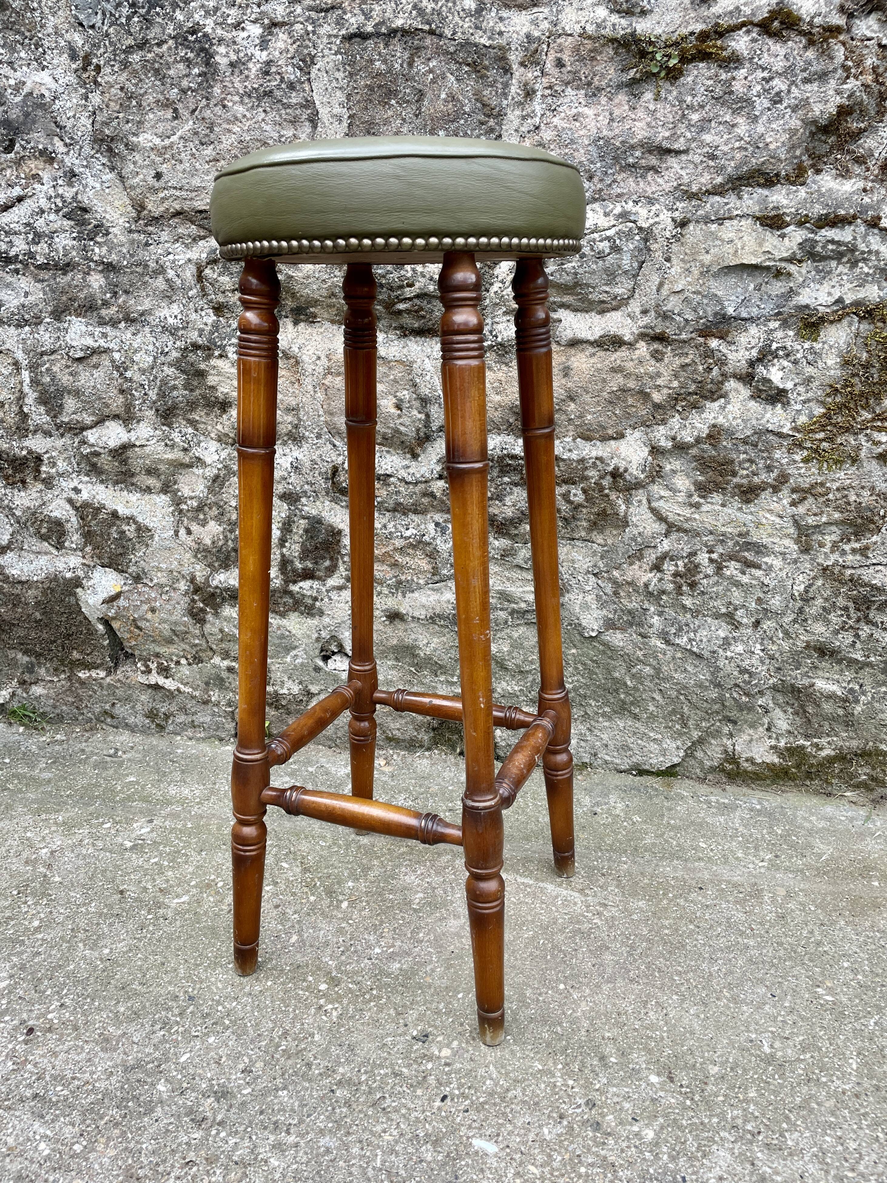Trio of leather bar stools
